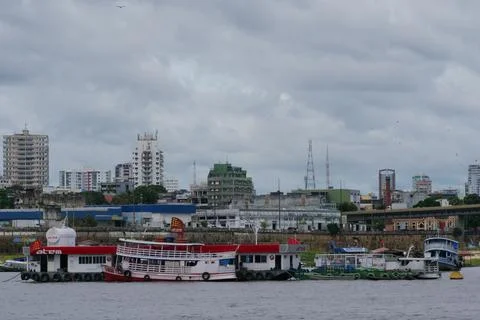 River view of a ferry refueling at a floating fuel station at the port of M.. Stock Photos