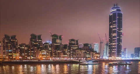 River view of high futuristic buildings in London, St George Wharf with Stock Footage 101047079