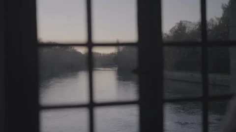 River View Through Rain Streaked Window at Dawn Stock Footage 340546307