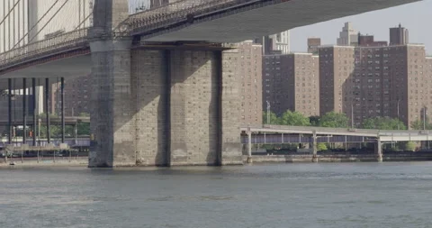 River view under a bridge in New York at day Stock Footage 150873197