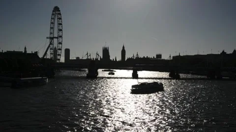 A river view of Westminster Palace, Big Ben and The London Eye . Video stock 43106835