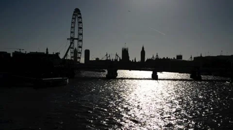 A river view of Westminster Palace, Big Ben and The London Eye . Video stock 43107759