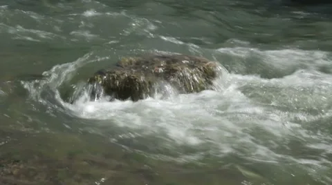 River washes the lonely rock Stock-Footage 7740736
