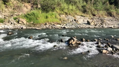 River Water Breaking Into White Rapids Over Exposed Stones In Nantou Stock Footage 342830426