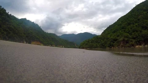 River water coming in front of camera at the mountain Stock Footage 220413587