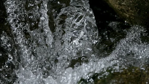 River Water Falling Over Rocks on Sunny Day Видео 270387590