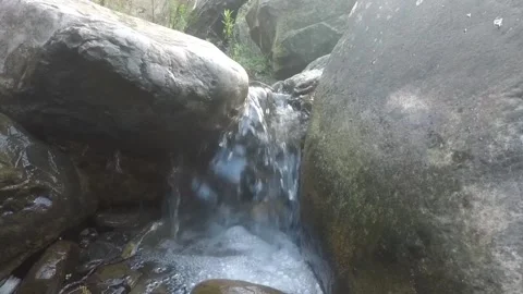 River water flow between rocks Video stock 148986576
