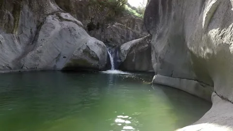 River water flowed from a small waterfall Video stock 149127903