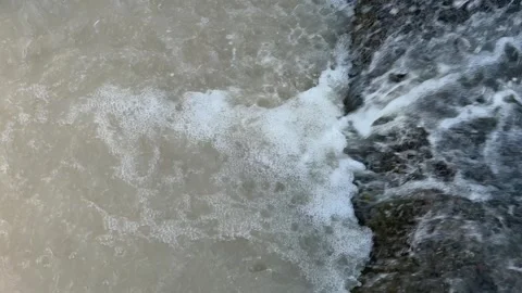 River water flowing along concrete edge outdoors Stock Footage 336959613