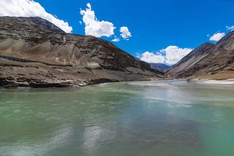 River water flowing at confluence of the Indus and Zanskar Rivers, known as S Stock Photos