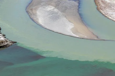 River water flowing at confluence of the Indus and Zanskar Rivers, known as S Stock Photos