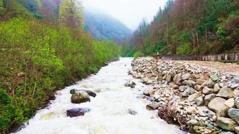 A river with water flowing down it Stock Footage 272796927