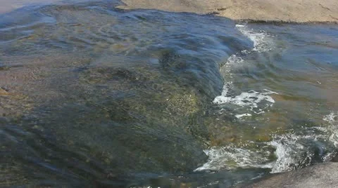River water flowing over rocks Stock Footage 11058685