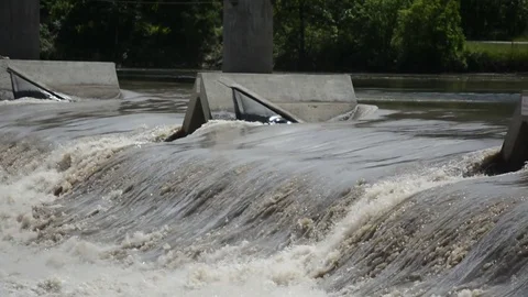 River Water Flowing Quickly Over an Overflow Dam Stock Footage 77198581