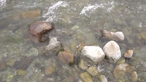 River water flows over rocks Stock Footage 239591809