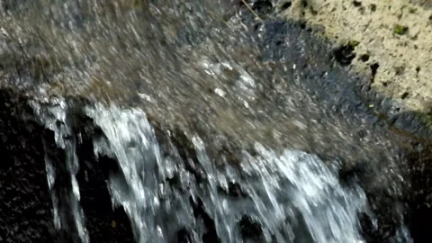 River water flows through rocks Stock Footage 320104876