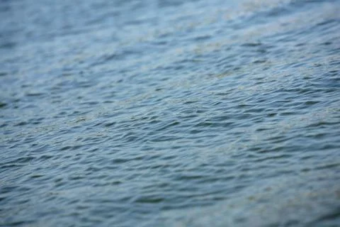 River water surface with waves, water surface background Stock Photos