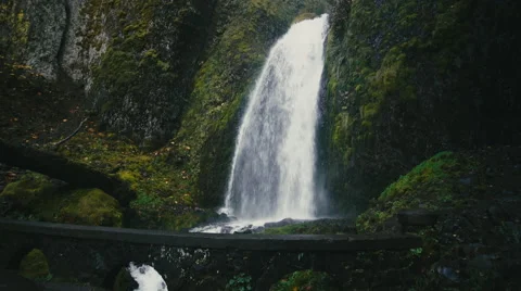 River Waterfall and Bridge Stock Footage 56840063