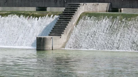 River, waterfall dam, flowing movement, with concrete stairs, catch basin Stock Footage 167947408