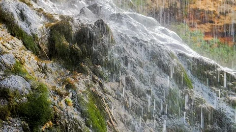 River waterfall falling on rock in slow motion Stock Footage 124390024
