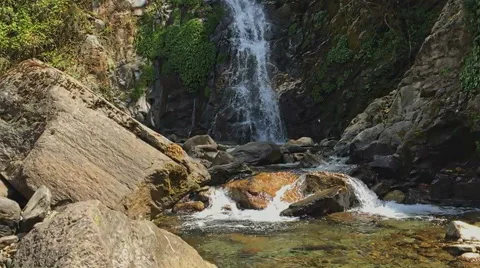 River waterfall in mountain forest Himalayas Nepal. Water, rock nature HD video. Stock Footage 64827470