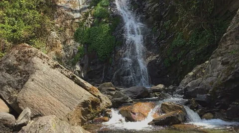 River waterfall mountain forest Himalayas Nepal. Water falling nature HD video Stock Footage 64827536