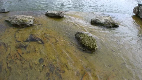 River waterfall. Water stream and rock stones. Stock Footage 153851254