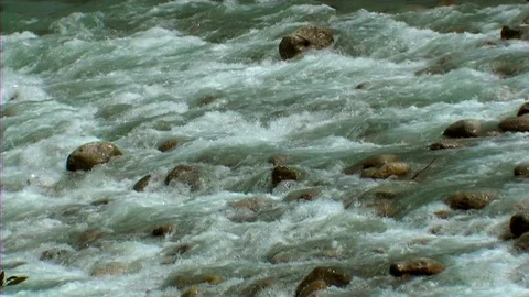 River waters flowing from mountains 動画素材 104127484