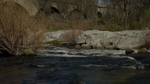 River waters rushing over rocks Stock Footage 335463349