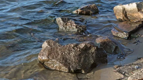 The River Waves Beating Stones at the Beach Video stock 45372094