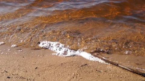 River waves bump on the sandy shore Stock Footage 126623043