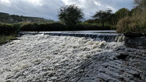 River  weir overflow Stock Footage 163827699