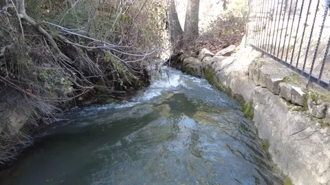 The river, which is located in the historical place, flows very fast. Stock Footage 230059197