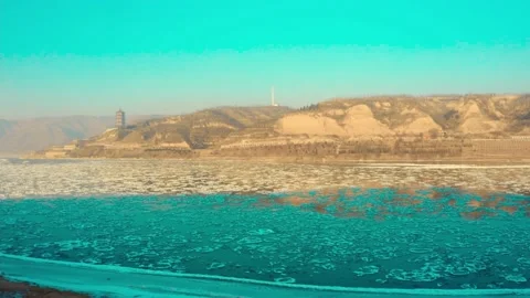 A river whose ice is about to thaw floats on the Yellow River Stock-Footage 157076230