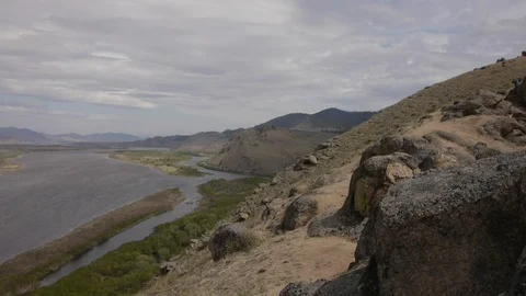 River in a wild valley Stockbeeldmateriaal 103438326