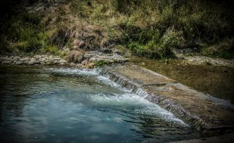A river in wilderness Stock Photos