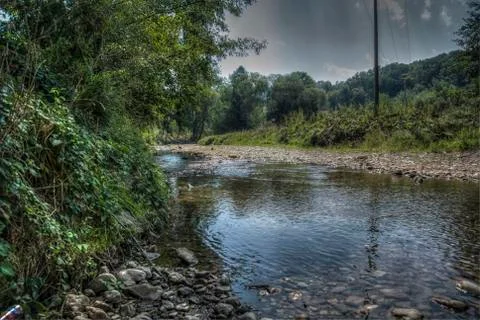 A river in wilderness Stock Photos