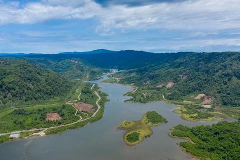 River winding through lush forested hills 스톡 사진
