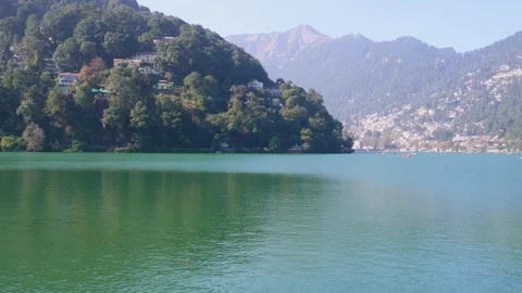 River Winding Through Lush Mountain Valley 库存影片 337630881