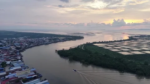 River winds through coastal town at sunset Stock-Footage 339854018