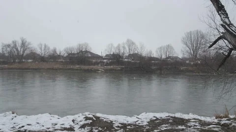 River in winter during snowfall Stock Footage 170447347