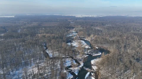 River winter floodplain delta snow meander drone aerial inland video shot in Stock Footage 264148496