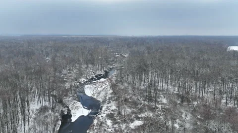 River winter floodplain snow meander delta drone aerial inland video shot in Vídeo Stock 227577195