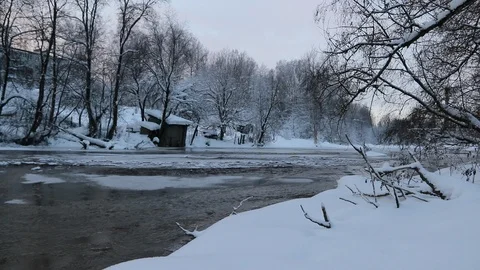 River in winter with snow. The river at dawn. Evaporation from water. Stock Footage 110048785