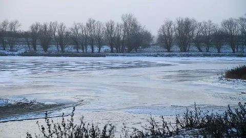 The river in the winter at sunset Stock Footage 321611891