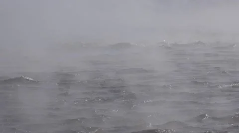 A river in the winter time with mist rising over rushing water. Stock Footage 60644551