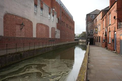 River Witham between old brick warehouses in central Lincoln Stock Photos