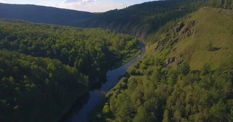 A river in the wooded mountains Stock Footage 80976599