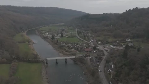 The River Wye and Wire Bridge at Tintern Abbey, Wales. UK Stock Footage 307000205