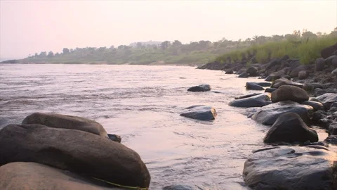From riverbank to rapids Stock Footage 119295278